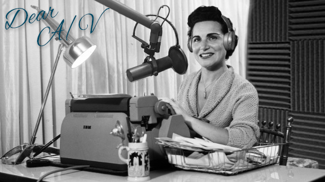 A black and white photo of Dear Abby journalist next to a typewriter with modern audio equipment in the frame.