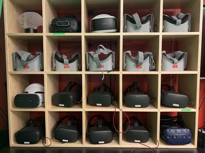 VR Headset Storage rack with Oculus GOs and Oculus Quest headsets