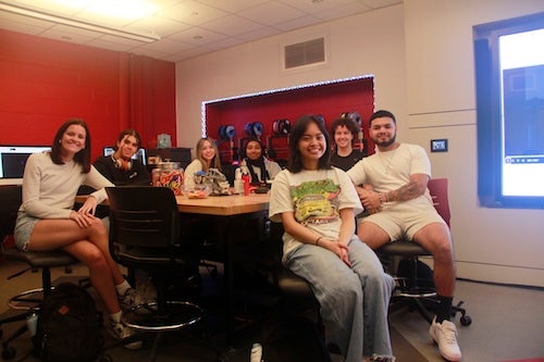 students sitting at a table together