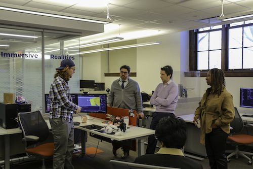 a man consulting with a group of people