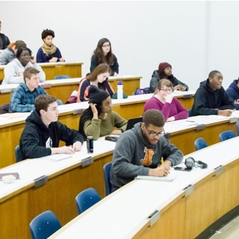Professor giving lecture to students
