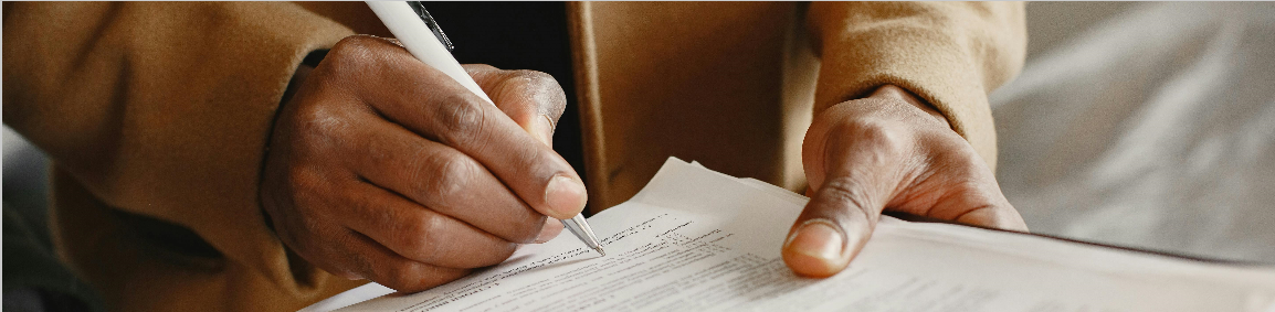 Student filling out evaluation form