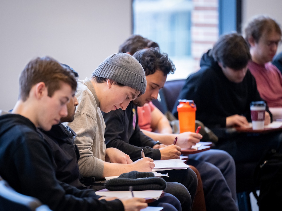 Students filling out ICES
