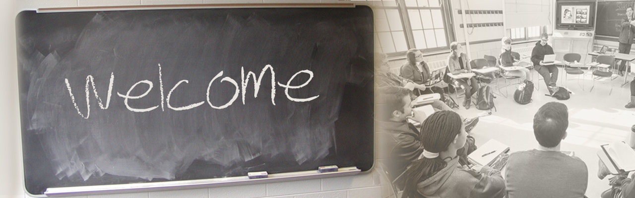 welcome on chalkboard and students at desks sitting in a circle