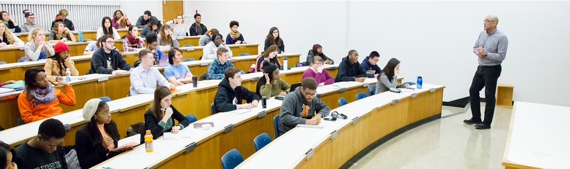 Professor giving lecture to students